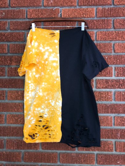 💛🖤 Hornet energy only. Our handmade Alabama State Alumni Half &amp; Half Distressed Off-Shoulder Lace-Up Tee is bold, fly, and full of that ASU pride. 🐝✨ Rock it your way — off-shoulder, lace-up, and made to turn heads.

#AlabamaState #ASUAlumni #HornetNation #HalfAndHalf