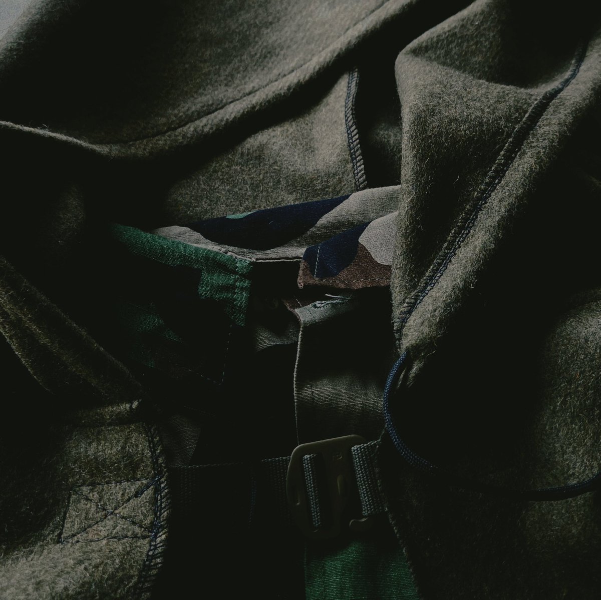 The timeless cloak, worn across ages. Reemerges here. The clasp is only the beginning.