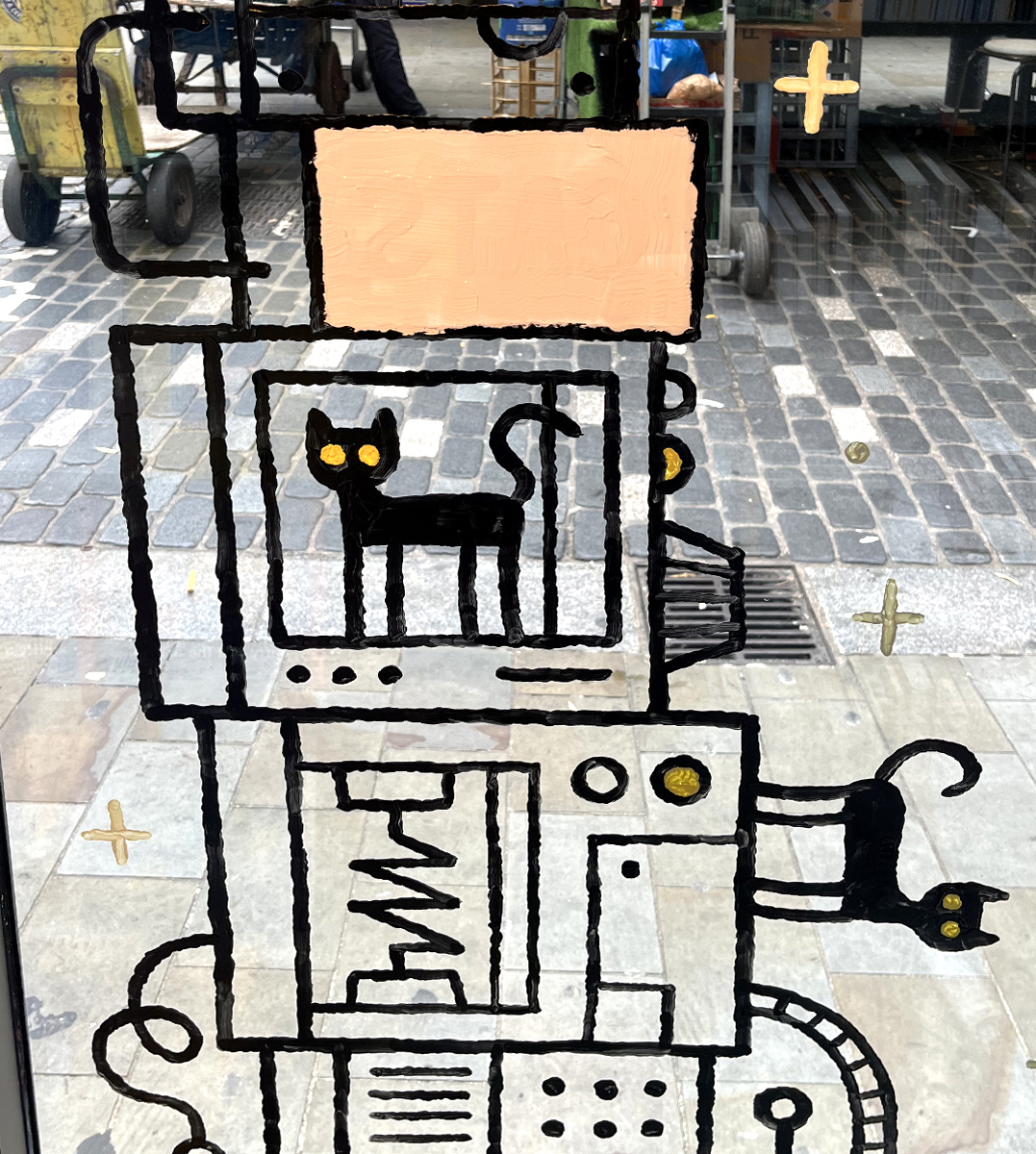 tomgauld's tweet photo. I went to @GoshComics today and painted the window. Just in time for the release and launch party for Physics For Cats. Come along and get a book signed tomorrow (Thursday) 7-9pm!
pic 1. In progress (from inside)
pic 2. The complete window, just waiting for copies of the book. https://t.co/VUah2EPXMU