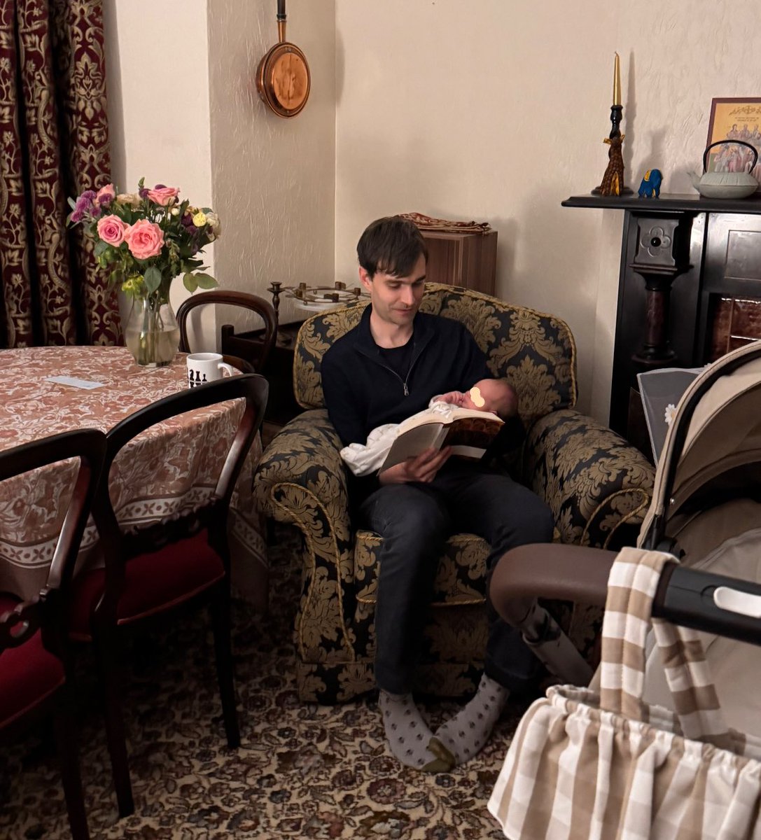 There are two forms of comforting baby boys outside of feeding:

The grandma approach (firm hold cradling) vs. The father approach (epic poetry about the Trojan War)