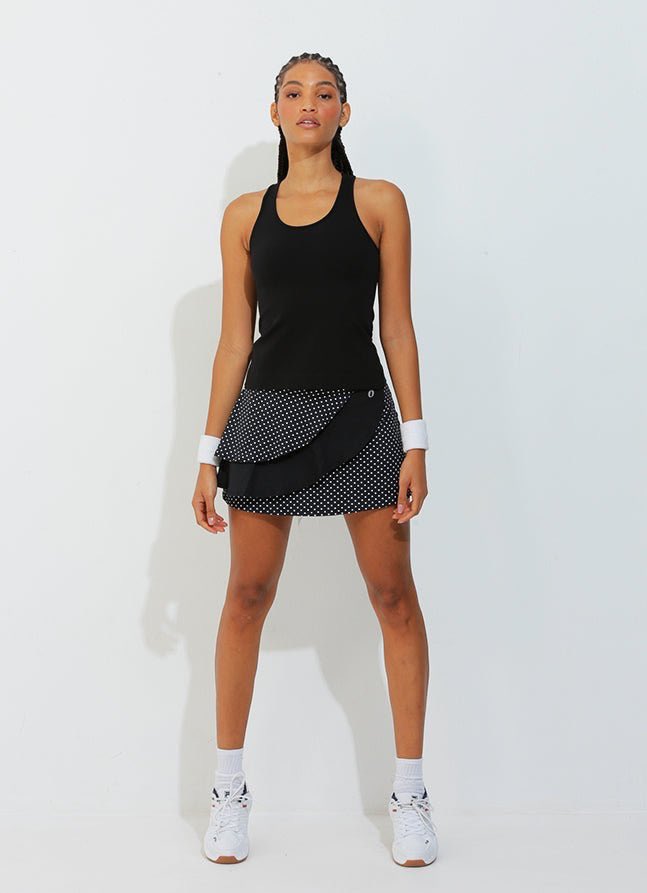Classic black &amp; white polka dot 🤍🖤 easy transitional #tennis skirt. 

donajobrand.com/products/spin-…