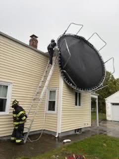 BreakngNewsPhtg's tweet photo. Meanwhile in Seekonk: “Today, Rescue 2 and Ladder 1 responded to a call for service regarding a trampoline which became airborne during a storm and landed on a roof.  Crews were able to successfully remove the trampoline by utilizing ground ladders.” 

📸:seekonkfd https://t.co/Zo5hlB1U3J