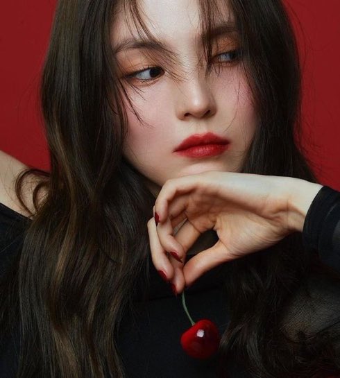 Red cherry on my hand