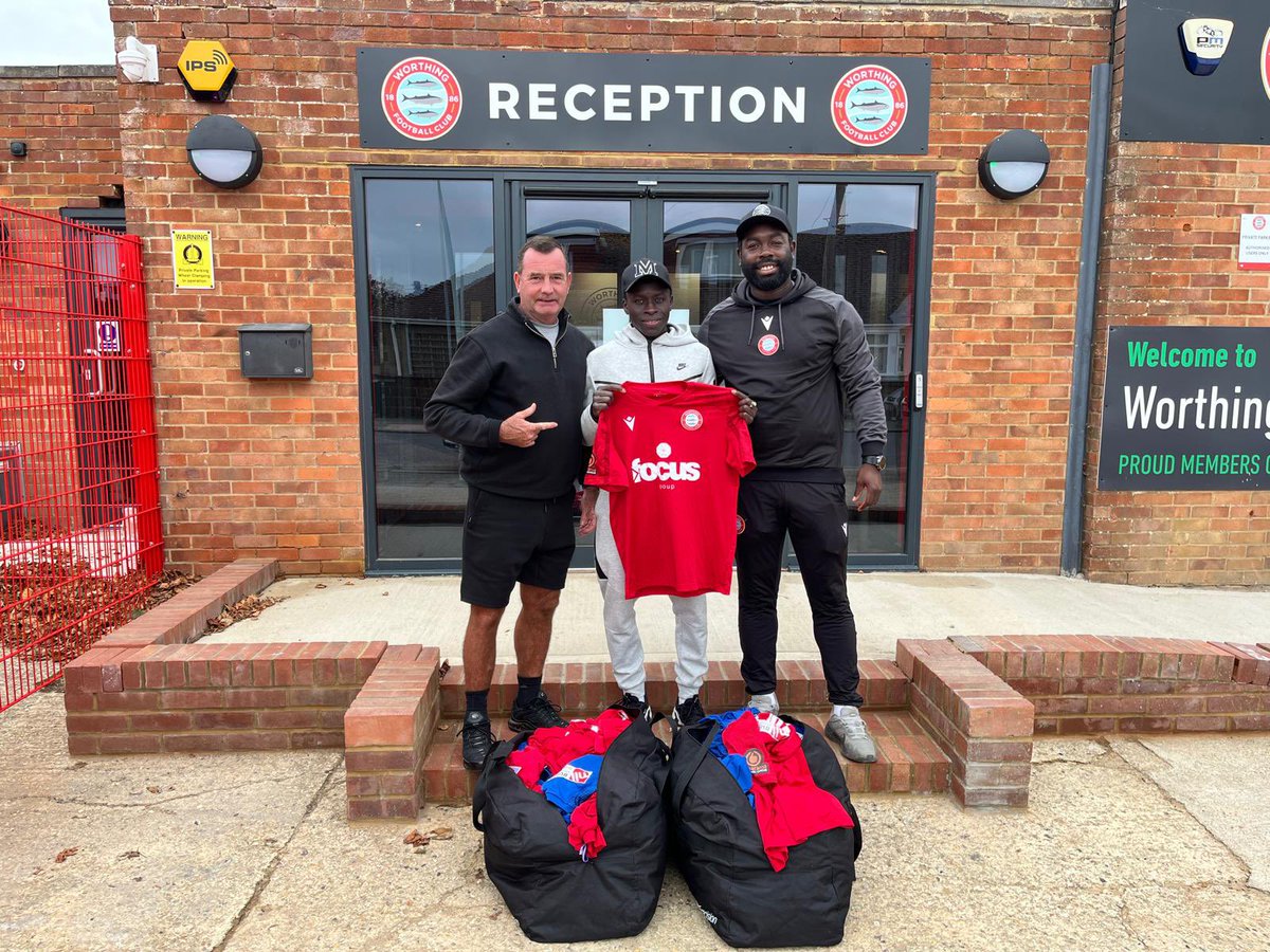 Huge thanks to Nathan Bowen at Worthing FC. for the clubs donation of last seasons first team kit for teams in The Gambia,pictured with Mo Jammeh &amp; Rick outside the ground . Container leaves tomorrow 🇬🇲🇬🇧 #somewishforitweworkforit