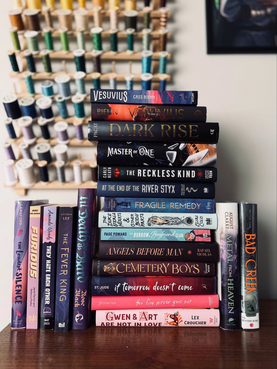 Stack of books by trans authors! Books by nonbinary authors! Books that have NEVER leaned on t/erf IP for marketing!