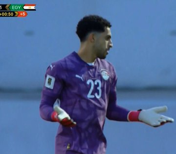 First image shows a goalkeeper in a purple patterned Puma jersey numbered 23 with Egyptian emblem and flag patch on sleeve, standing with red gloves extended, blue stadium background, scoreboard displaying 0-5 score and 45 minutes for Egypt vs opponent. Second image depicts the same player in similar purple jersey, positioned in goal area with arms raised wearing red gloves, scoreboard at 0-3 with 0 minutes. Third image features the player in purple jersey facing the goal net, one arm extended with red glove, scoreboard showing 0-3 at 0 minutes, blue sky and stadium elements visible.