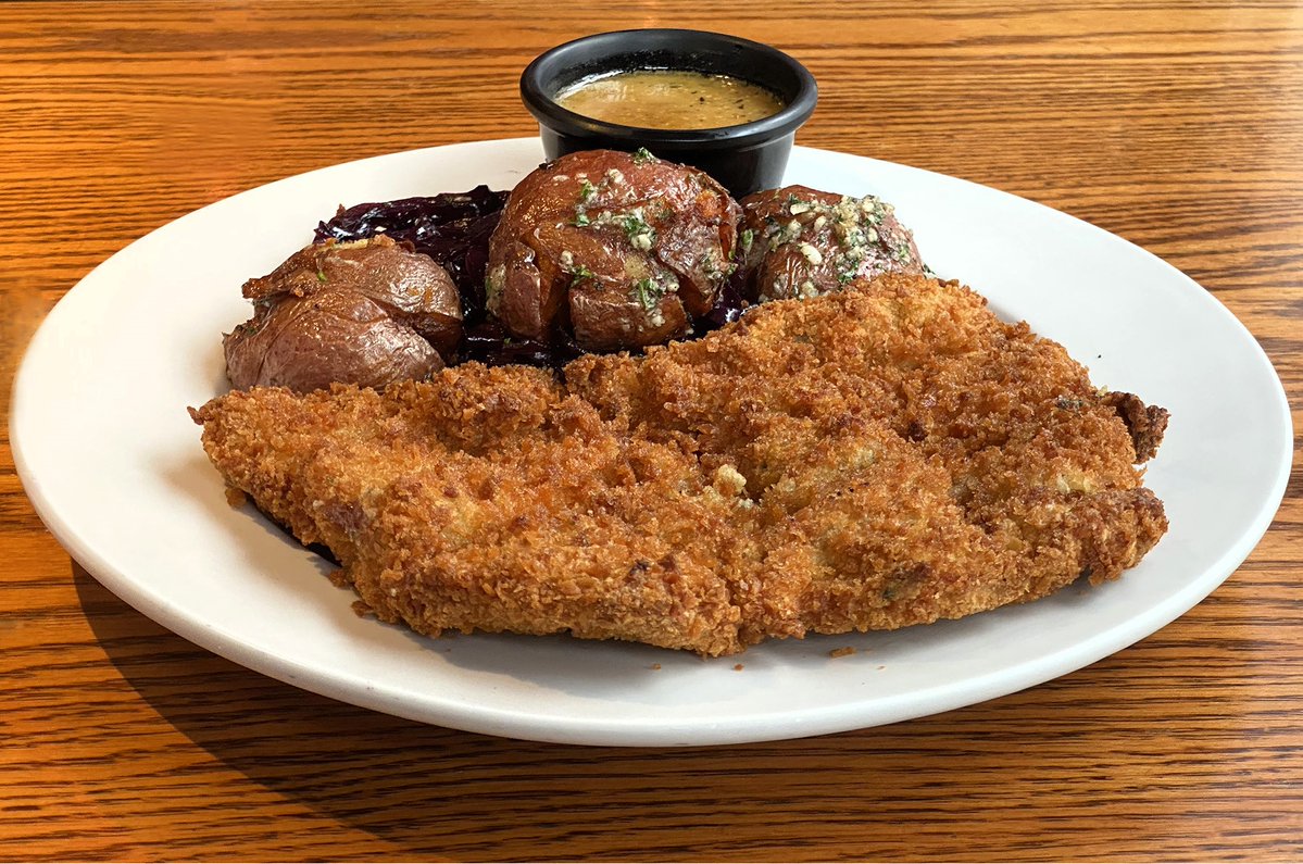 Did you know October is #NationalPorkMonth? We suggest our #SlagelFamilyFarm Boneless Pork Schnitzel, with cider-braised cabbage, smashed red potatoes and pan sauce. Available after 4 p.m. daily!  📷TLM #chicagobars