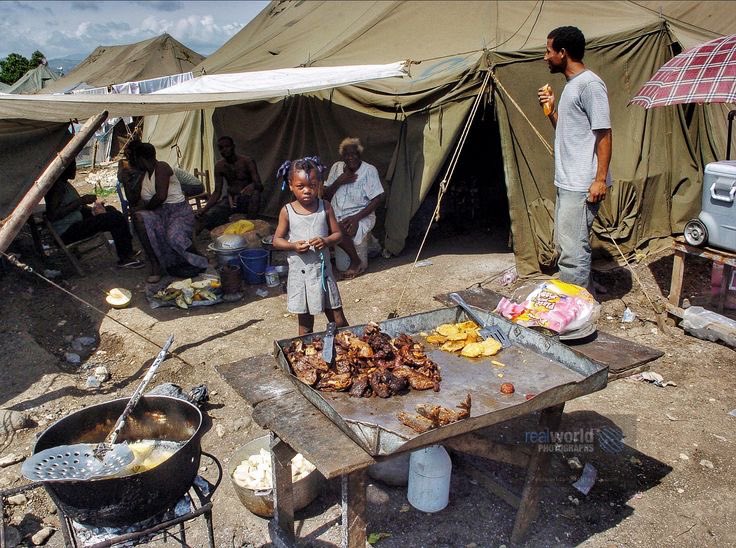 RealWorldImage's tweet image. A young Haitian refugee looks over a grill in a Jacmel, Haiti refugee camp.
Set up after the devastating 2010 earthquake. Gary Moore photo. Real World Photographs. #photojournalism #Haiti @NikonUSA #realworldphotographs #garymoorephotography @X #earthquake #photography