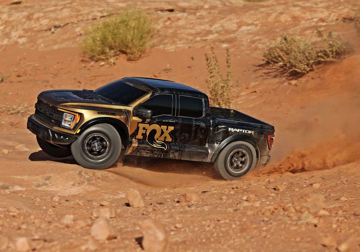 Traxxas's tweet photo. Shining like GOLD! 🏆 

The #Traxxas Raptor R 4X4 Ultimate will turn heads everywhere you go, with performance to match its killer looks! 🔥

—> https://t.co/Ag8AHz1TdS

[[Model # 101177-4]] #TraxxasRaptorR #FordRaptor #RaptorR #RideFox 
#FastestNameInRadioControl #RC https://t.co/We7xfzCMIu