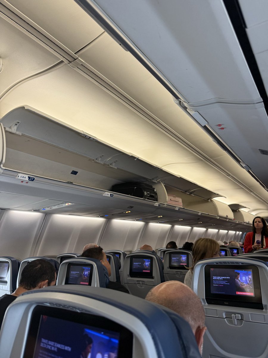 My first time flying <a href="/Delta/">Delta</a> in years and now I remember why. I got forced to check my carry on at the gate and this is what the overhead bins look like 4 mins prior to take off. Love traveling after a long day of meetings to have to wait an additional 45 mins for my 21” bag…