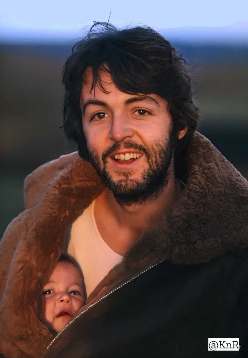 holding it like he’s the one who gave birth