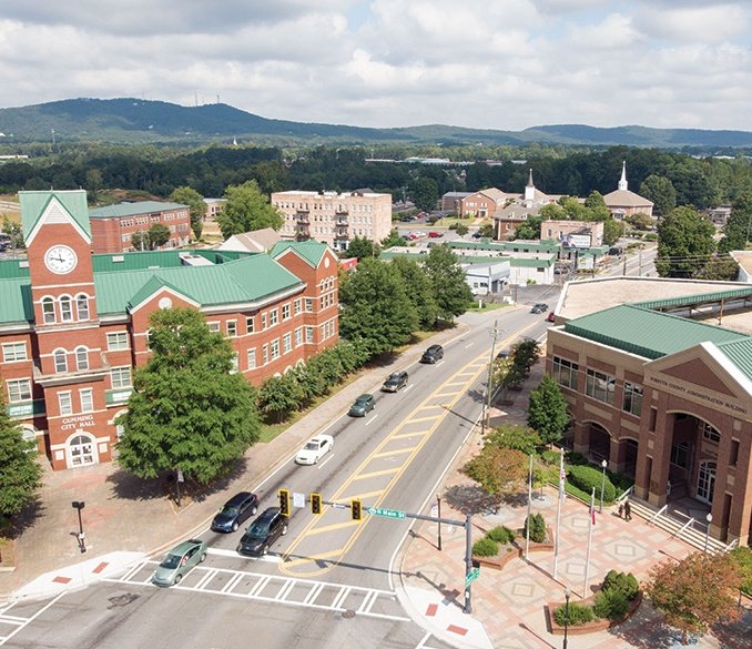 KJVPopulist's tweet photo. Republican town is probably representative of a suburb like Forsyth county, GA. Voting wise https://t.co/QFW27V5zna