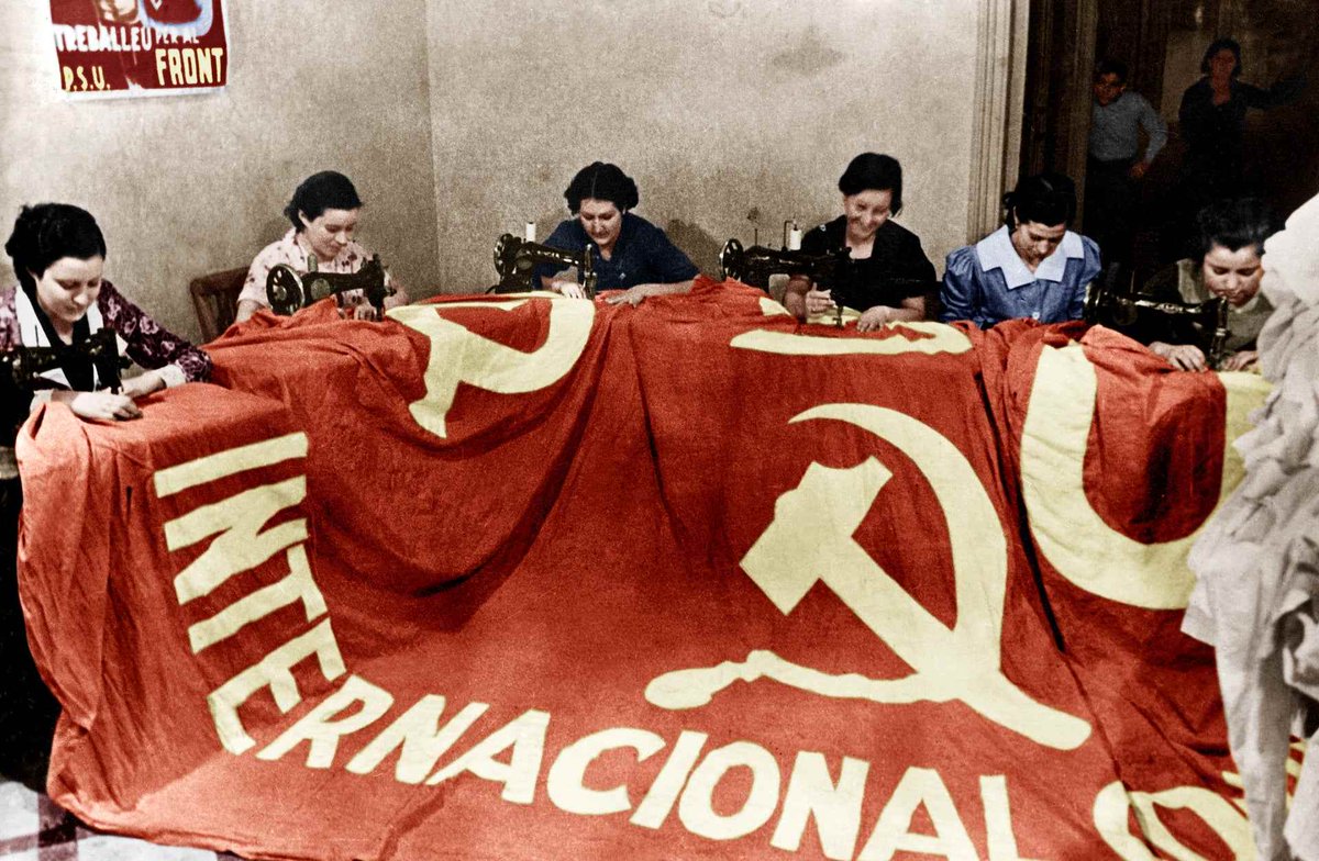 Making of a flag for the International Communist Brigade
during the Spanish Civil War, 1936.