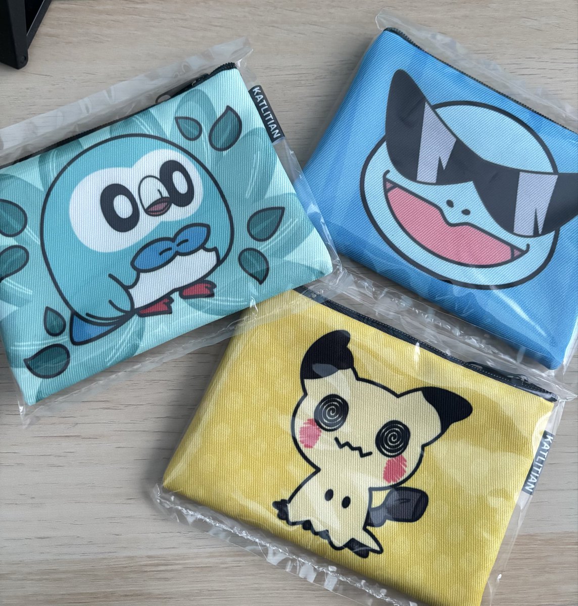 katlitian's tweet photo. Forgot to post these pouches that I launched at CosMania.
#ShinyRowlet #Mimikyu #Squirtle #Pokemon https://t.co/TuJ94uAJot