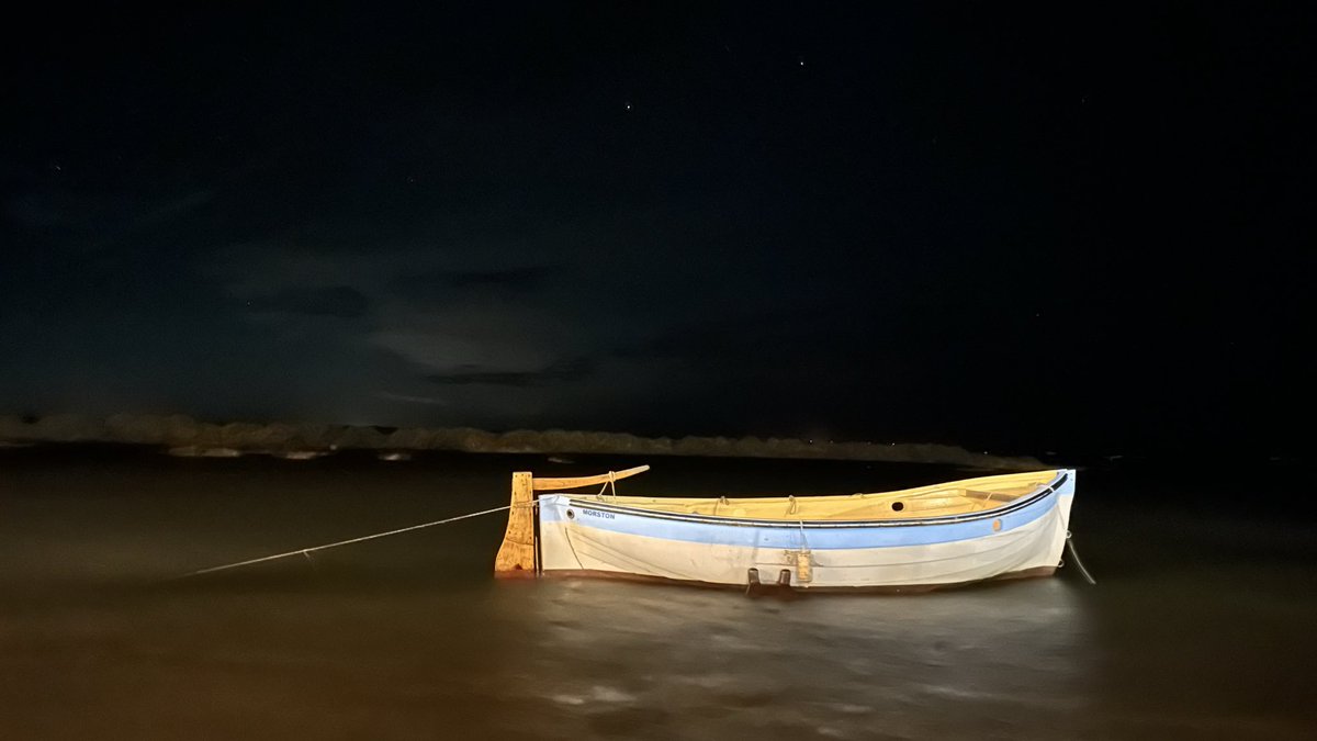 High tide at Blakeney this evening as the sea leaves the channel and comes up onto the road.
