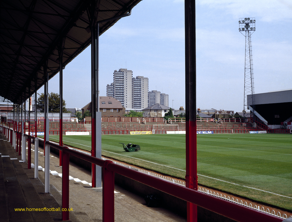 I've got the best ever football pictures to sell/own/hang.

These are MY top 815 pics only, across the first 36 years of my doing the Homes Of Football opus...

#579 BRENTFORD "MOWING GRIFFIN PARK" yr1990  Photo©stuartroyclarke/homesoffootball