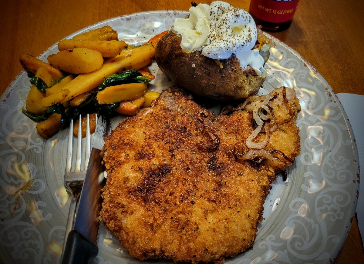 DJ's Bistro Thursday Dinner Special! 🚨  Fried bone-in Pork Chop, loaded baked potato and hot-honey carrots &amp; spinach