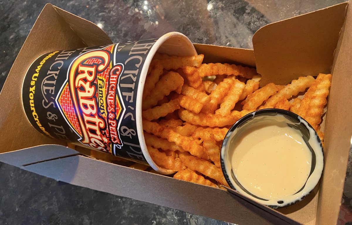 Chickie &amp; Pete's Crab Fries(with their iconic creamy cheese sauce).
