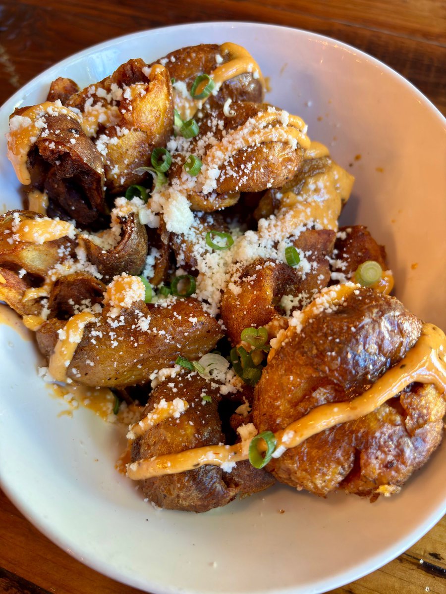 Crispy, creamy, and just the right amount of kick. 🔥 Our Patatas Bravas bring together golden fried Yukon potatoes, chipotle aioli, queso cotija, and scallions — a bold take on a classic that’s impossible to stop picking at.