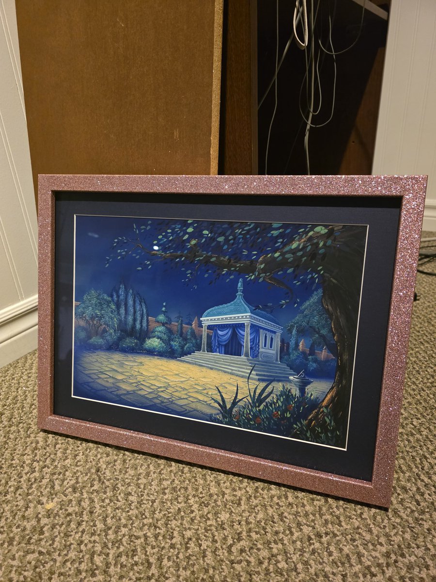 The Mumfie background painting that  I won in the Britt Allcroft auction, Is home from getting a custom frame.

I gave it a sparkling pink frame, with a night blue matte.

The painting is the Queen of Nights gazebo. The one character Britt voiced herself