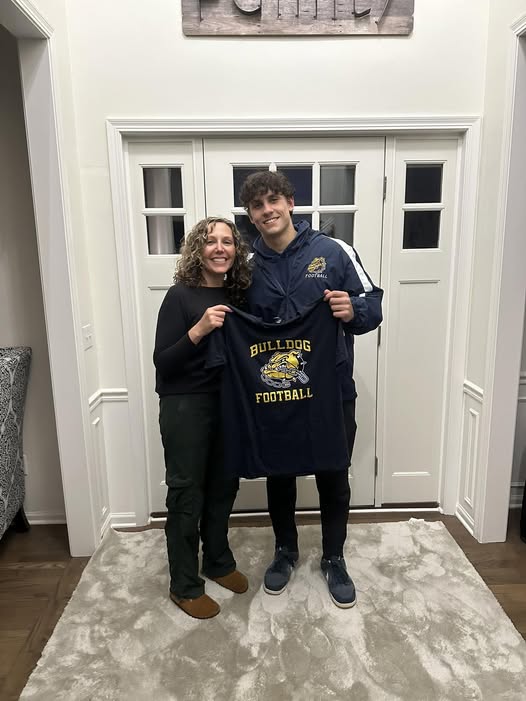 Senior Captain Owen Singleton #26 honored Mrs. Caso as his Playmaker with gratitude for playing such a meaningful role in his growth as a Bulldog from the start!  We look forward to recognizing Mrs. Caso and all Playmakers during Senior Night on Friday! <a href="/OSingleton26/">Owen Singleton</a> <a href="/OFfootball1/">OFfootball</a>