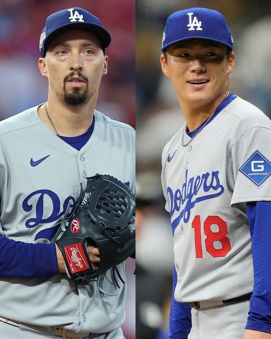 On left, Blake Snell. On right, Yoshinobu Yamamoto. They both wear road gray Dodgers jerseys with blue caps.