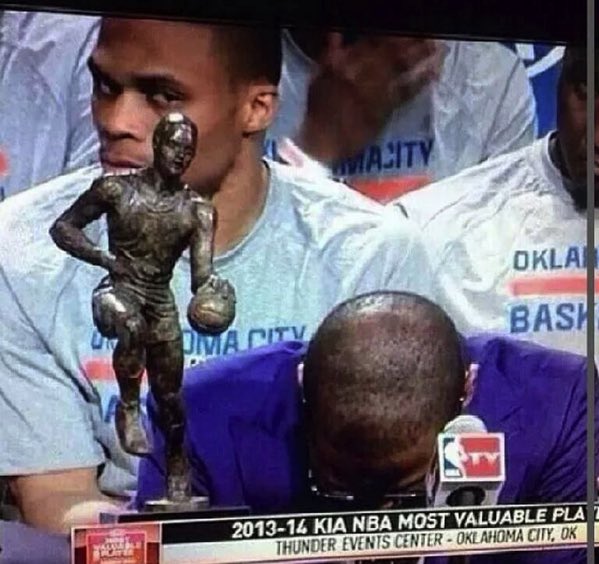 Kevin Durant looking at the Thunder's championship rings 