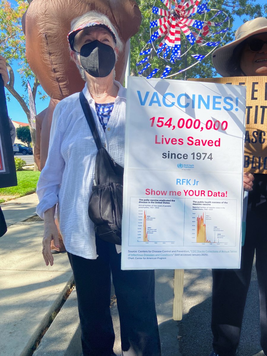 “I was excited to see a demonstrator at the No Kings rally in Mountain View (CA) making the case for vaccination efficacy… and wearing a mask as well!” — a member of Raging Grannies took this picture on #NoKingsDay. Vaccination is a lifesaving tool for many preventable diseases.