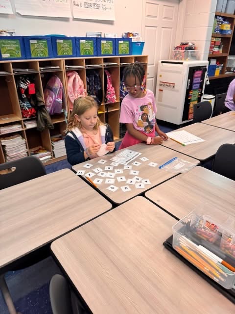 OESCards's tweet photo. Ms Stacy Vincent's 1st graders practiced 3 digit addition and reading cvc words in math today.   Each letter had a value and students had to add it together. ❤️ https://t.co/lI8DZVWVZN