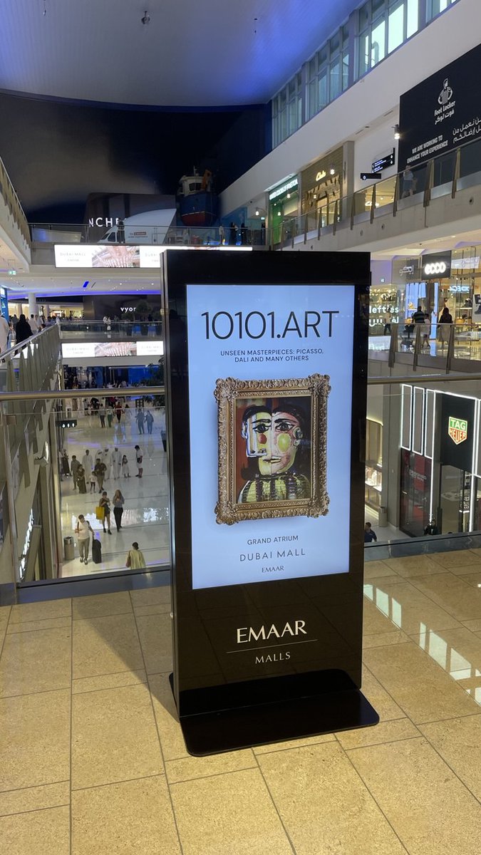 AltCryptoGems's tweet image. Been walking around Dubai and keep seeing more and more screens showing paintings — anyone know what project this is?