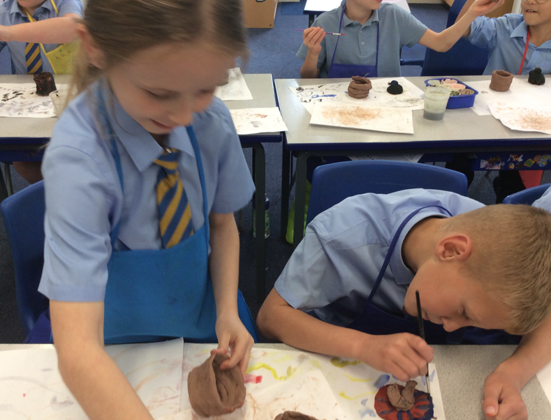 In year four's Art lesson, the children finished their canopic jars. They painted them beautifully &amp; started by using primary colour paints similar to those which the Ancient Egyptians themselves might have used.