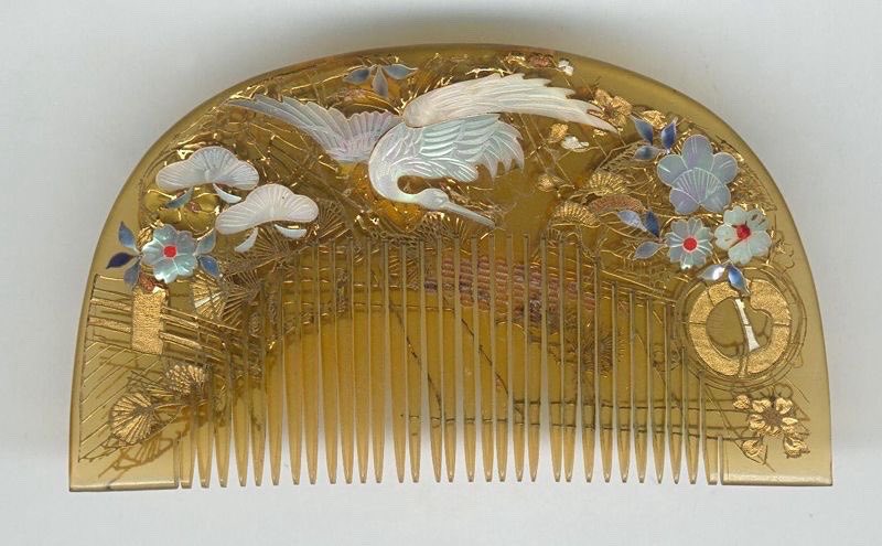 this bekko comb with crane and flower motif is so beautiful
