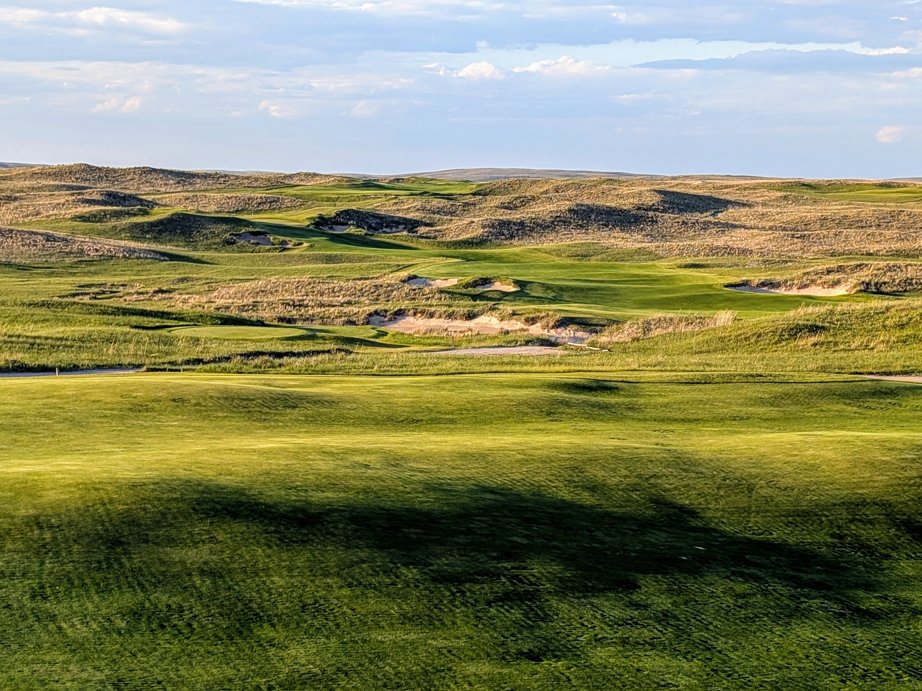 What is the best golf photo you've taken in 2025? It's 38 with 20-30 mph winds this morning so I am daydreaming about my summer journeys.

Here is mine: