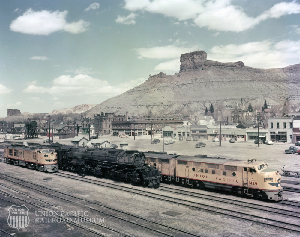 UPRRMuseum's tweet photo. An F-9 diesel, a “Big Boy,” and Turbine 60 a.k.a the “Big Blow,” (4,500 horsepower “gas turbine” locomotive) lined up in front of the depot in Green River, Wyoming. https://t.co/DsqIb1s9qW