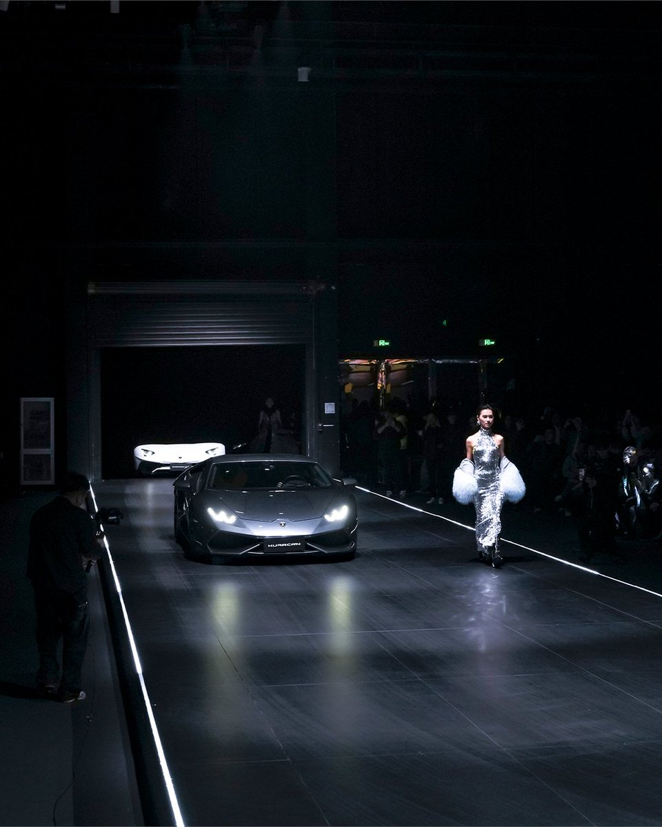 Lamborghini's tweet photo. 20 years in China, one unforgettable celebration. We marked our two-decade milestone in Shanghai with the reveal of the Revuelto 20th Anniversary Edition. Its Giallo Inti finish lit up a night filled with fashion, art, and pure performance. A symbol of our shared passion. https://t.co/37PHGlQwMK