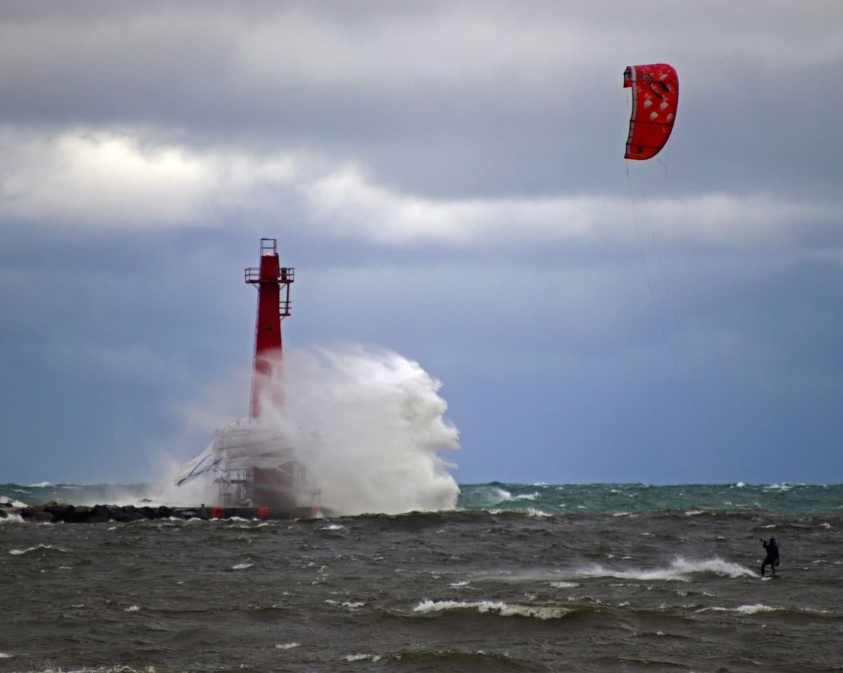 The South Breakwater Lighthouse Muskegon’s Pere Marquette beach on Lake Michigan is taking a pounding with today's weather. I took these photos today October 22, 2025. The lighthouse is in the process of getting much-needed restoration. #weather