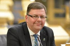UnityNewsNet's tweet image. MSP Colin Smyth has today appeared in court charged with child sex offence.

He appeared in private at Dumfries Sheriff Court where he faced two charges.

The first is a charge under a section of the Sexual Offences (Scotland) Act dealing with voyeurism, which refers to recording…