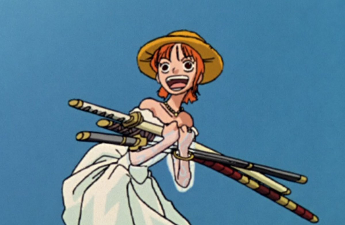 Nami with Luffy's hat and Zoro's swords❤️💚