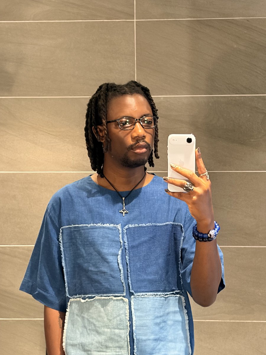 the paystack kenya office reception at close of business and a mirror selfie from this morning.