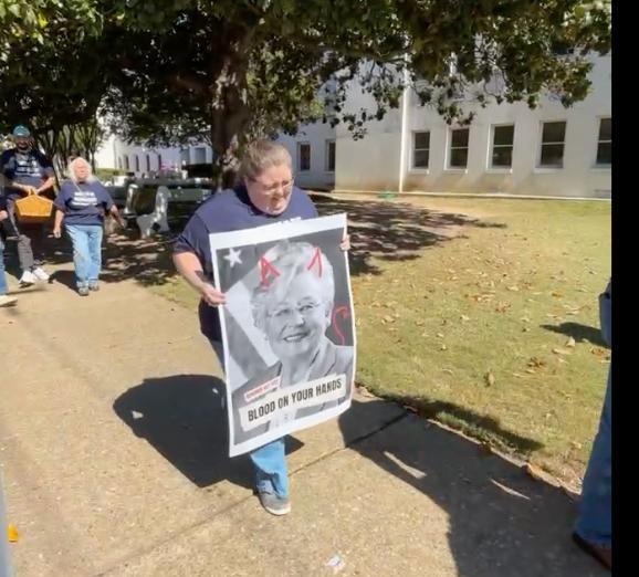 Large group of protestors hit streets of Montgomery after Alabama's prison oversight meeting, calling for accountability with officer accused of excessive force and other preventable record deaths inside ADOC.