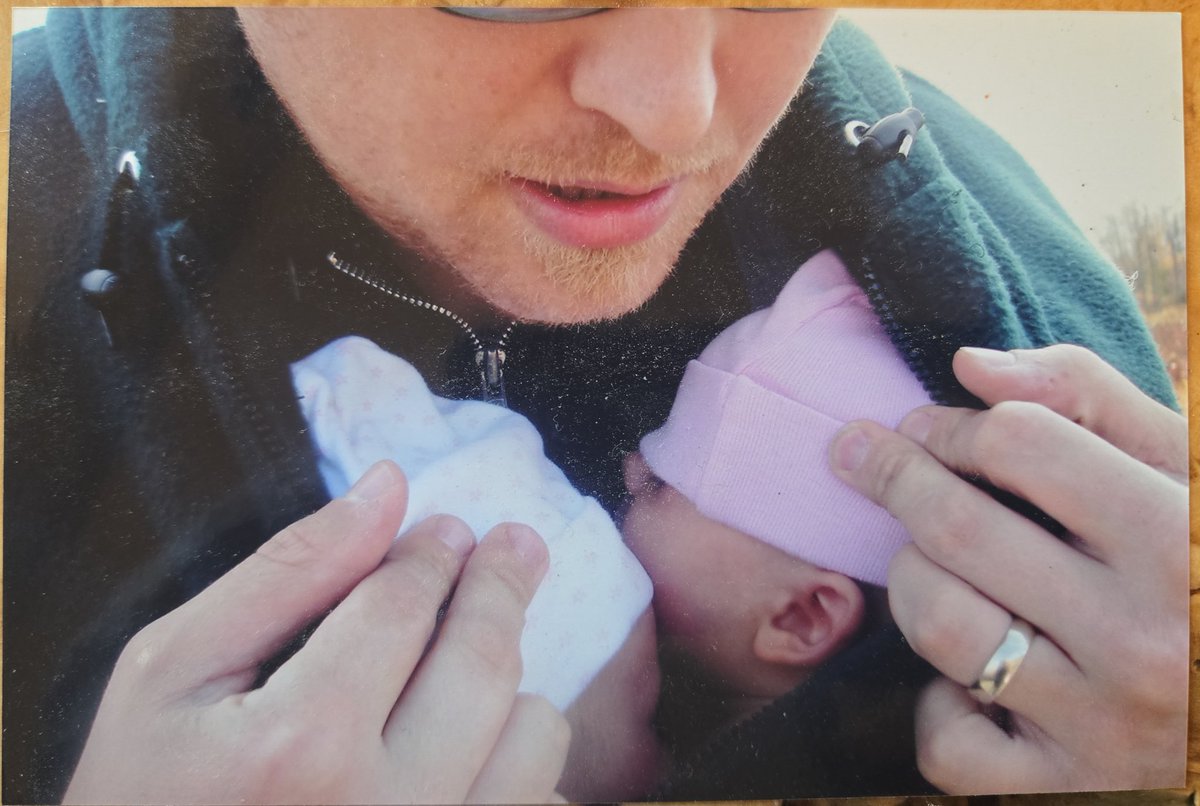 18 years ago, me wearing our twin girls in a baby sling whilst walking around chilly Chicago.

📷 <a href="/MystagogicalB/">Hannah</a>