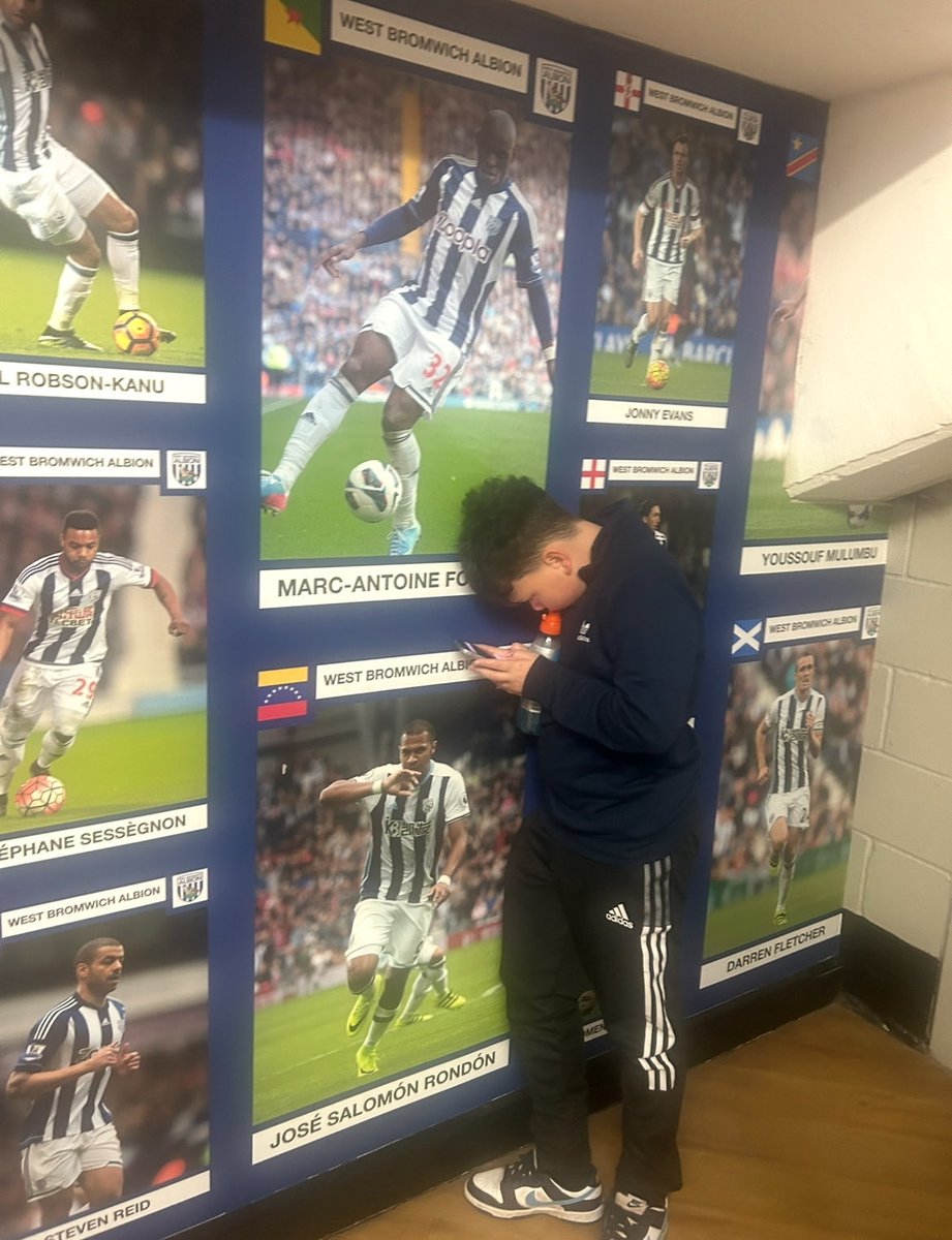 NickSharyne's tweet photo. @shilensays @AndrewMNestor Ignore my son desperate for reception! you’ll spot an absolute Albion legend hidden behind the pillar! 🙌
Please, can we fix this? Youssouf Mulumbu will always be a fan favourite — he gave us our first win over Villa in 20+ years and that goal vs Everton 👏💙⚪️ #WBA #Mulumbu https://t.co/uEXtwje2UL