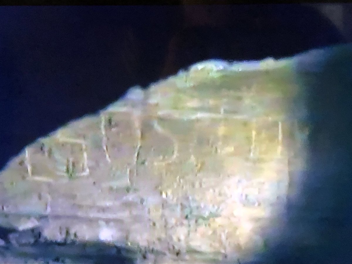 Horinstoon's tweet photo. @AcordRussell 
Is this cave writing? Time was 39:16 on my TV. https://t.co/LCodAzi6N2
