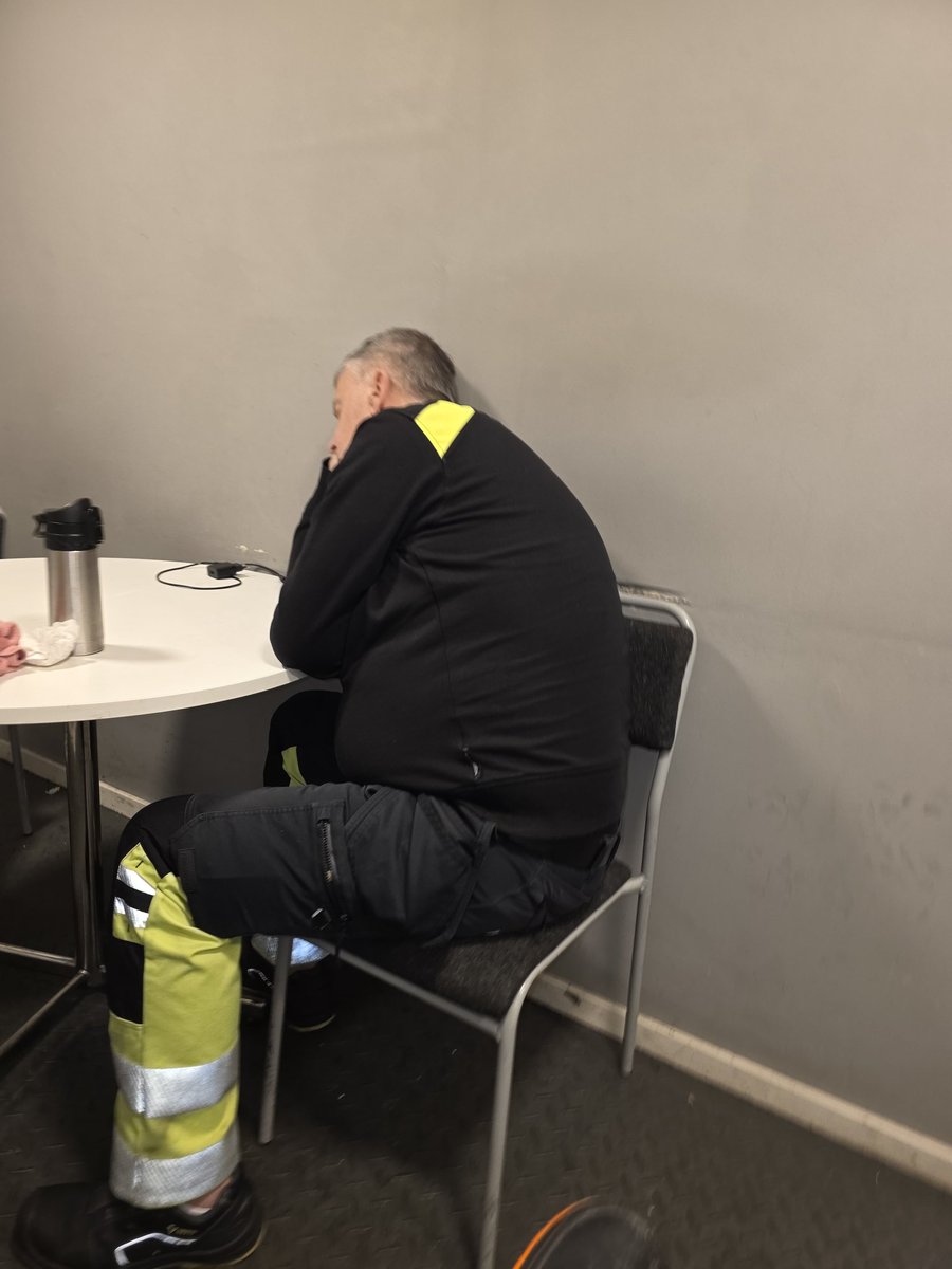 It must be hard work for him. He's only been in work 2 hours and he's fast asleep