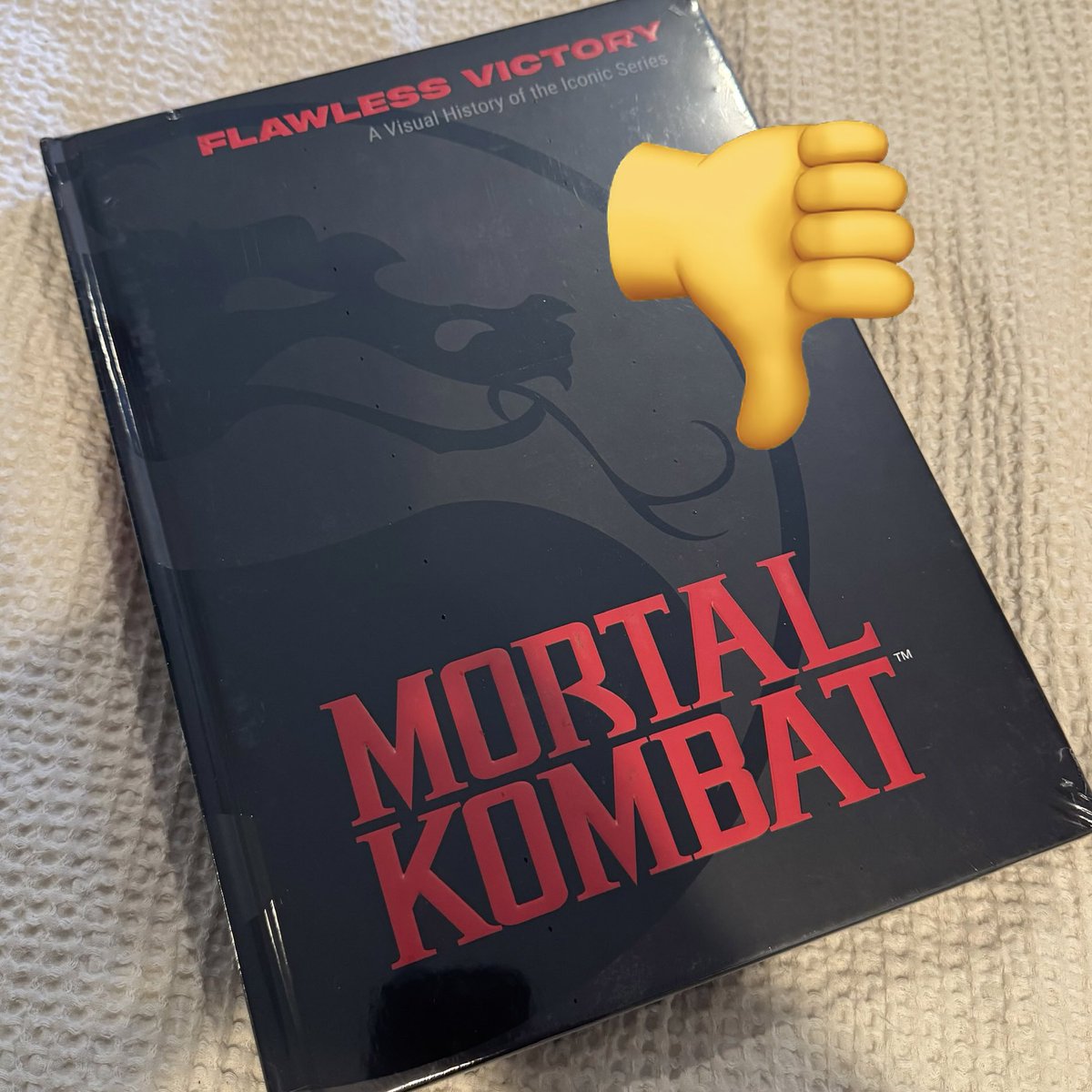 thebrokenlaser's tweet image. Received my #MortalKombat book. It arrived damaged on the spine so waiting for a replacement however, from the screenshots I&apos;ve seen...I&apos;m so disappointed and will be sending back for a refund. This could have been something great like what @UppercutLLC was working on. (1 of 3)
