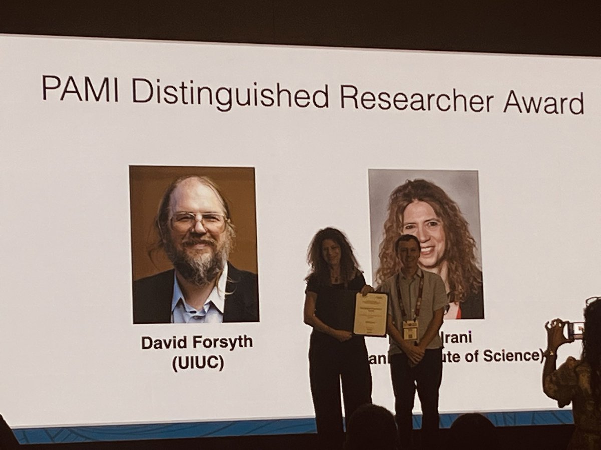Michal Irani receiving the distinguished researcher award.