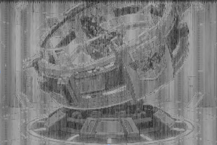 thrax_nft's tweet image. Cleaned up the images a bit
There's a figure in some chamber, in a lab maybe? 
Second device could be a Team Moth time machine - or a  microwave. I haven't the foggiest.