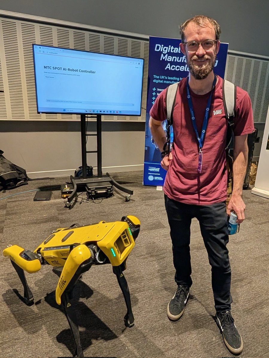 WirralCode's tweet image. Dan, our volunteer, learning that this @BostonDynamicsOfficial #SpotRobot runs off #Python at the #LCRAISummit today :D