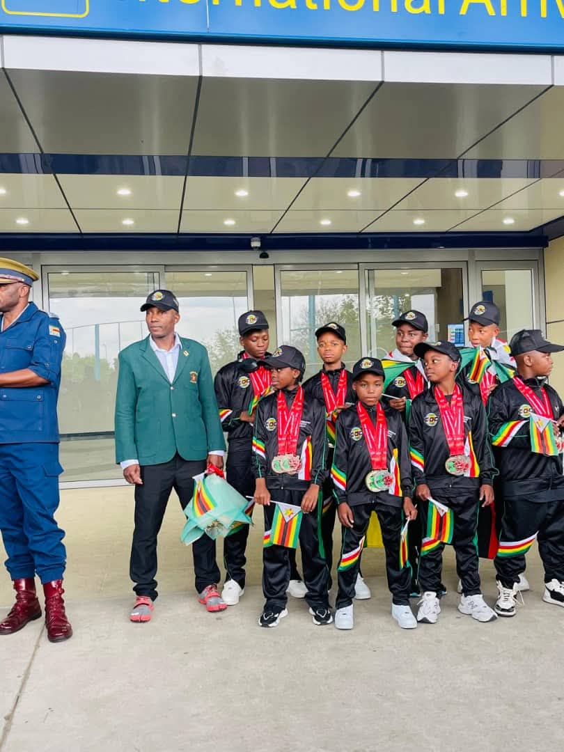 The Zimbabwean flag flew high at the #RGMI Airport on Tuesday as eight young martial artists and their coach, Shihan Wilfred Mashaya, received a hero’s welcome upon returning from the International Combat Organisation (ICO) World Championships held in Swansea, Wales.