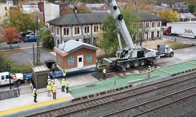 Crews delivered and installed a new prefabricated shelter for Amtrak passengers in Huntingdon as part of improvements being made in preparation for an increase in daily stops at Huntingdon in 2026.